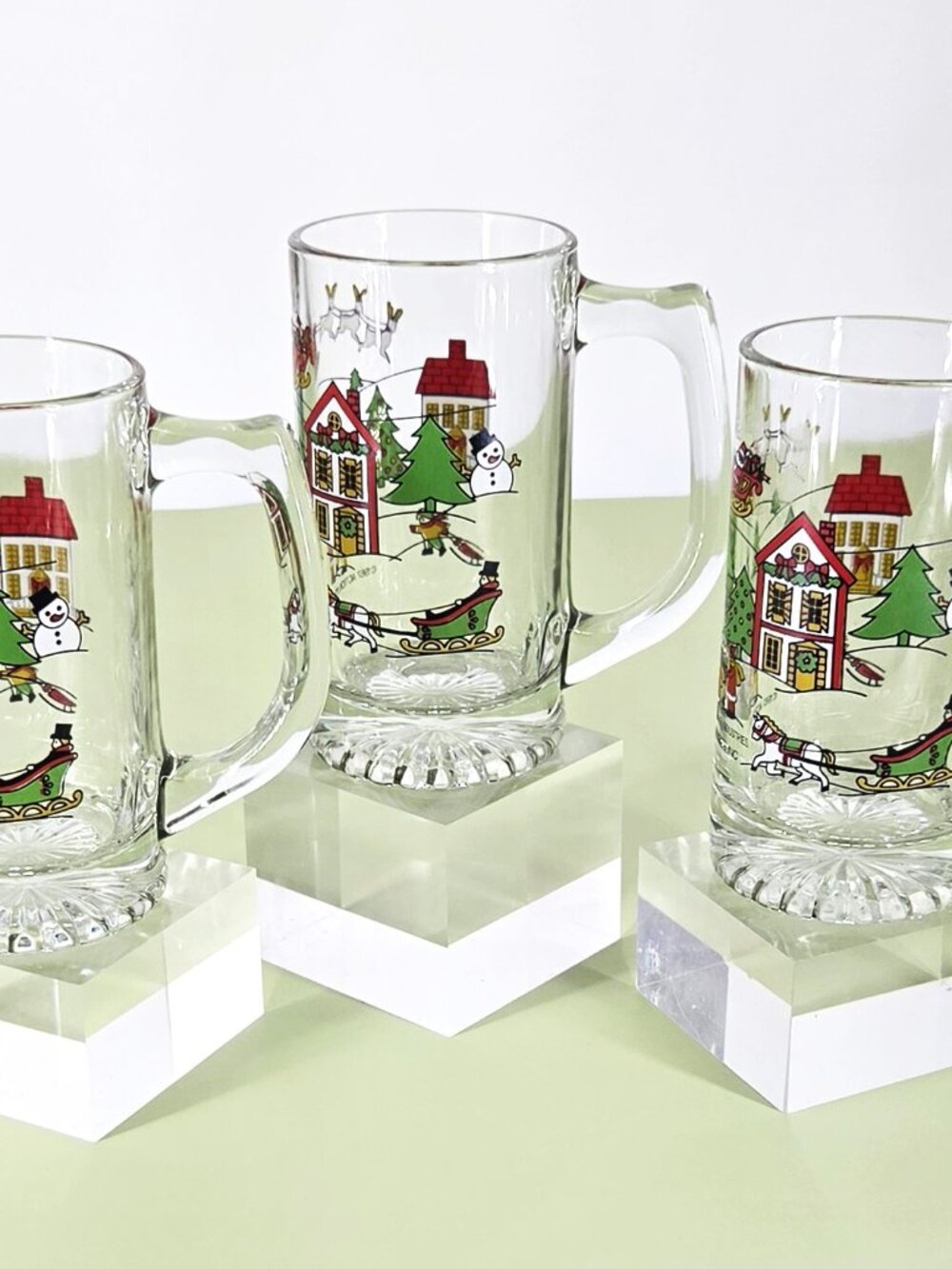 1987 Action Industries 3 Glass Mugs Christmas Santa Snowmen Sleigh Color Scenes